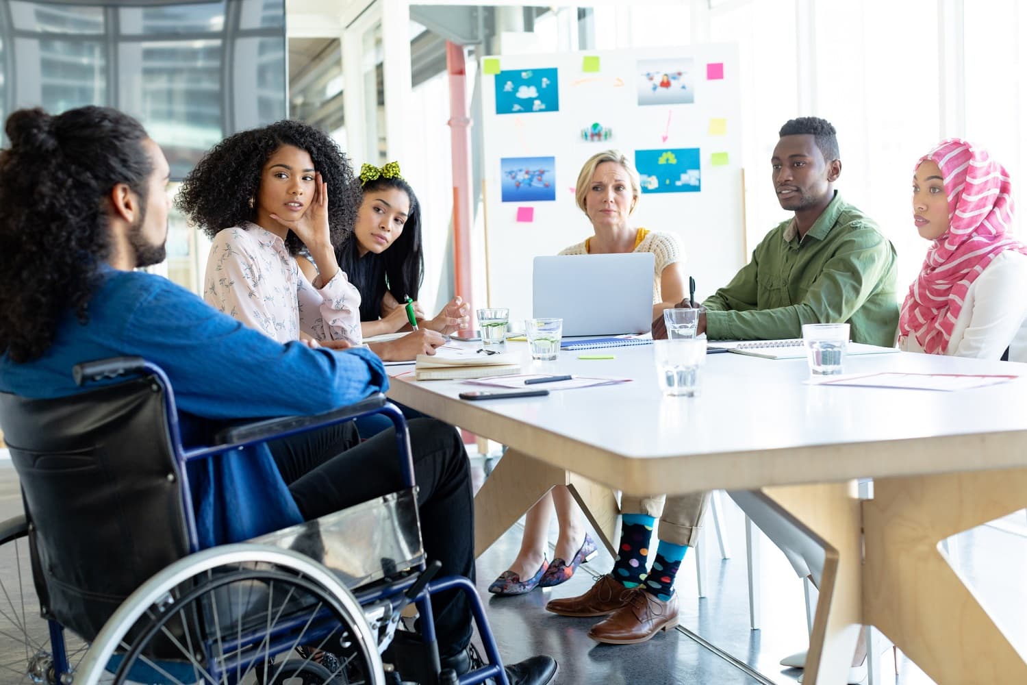 people sitting around a conference table working