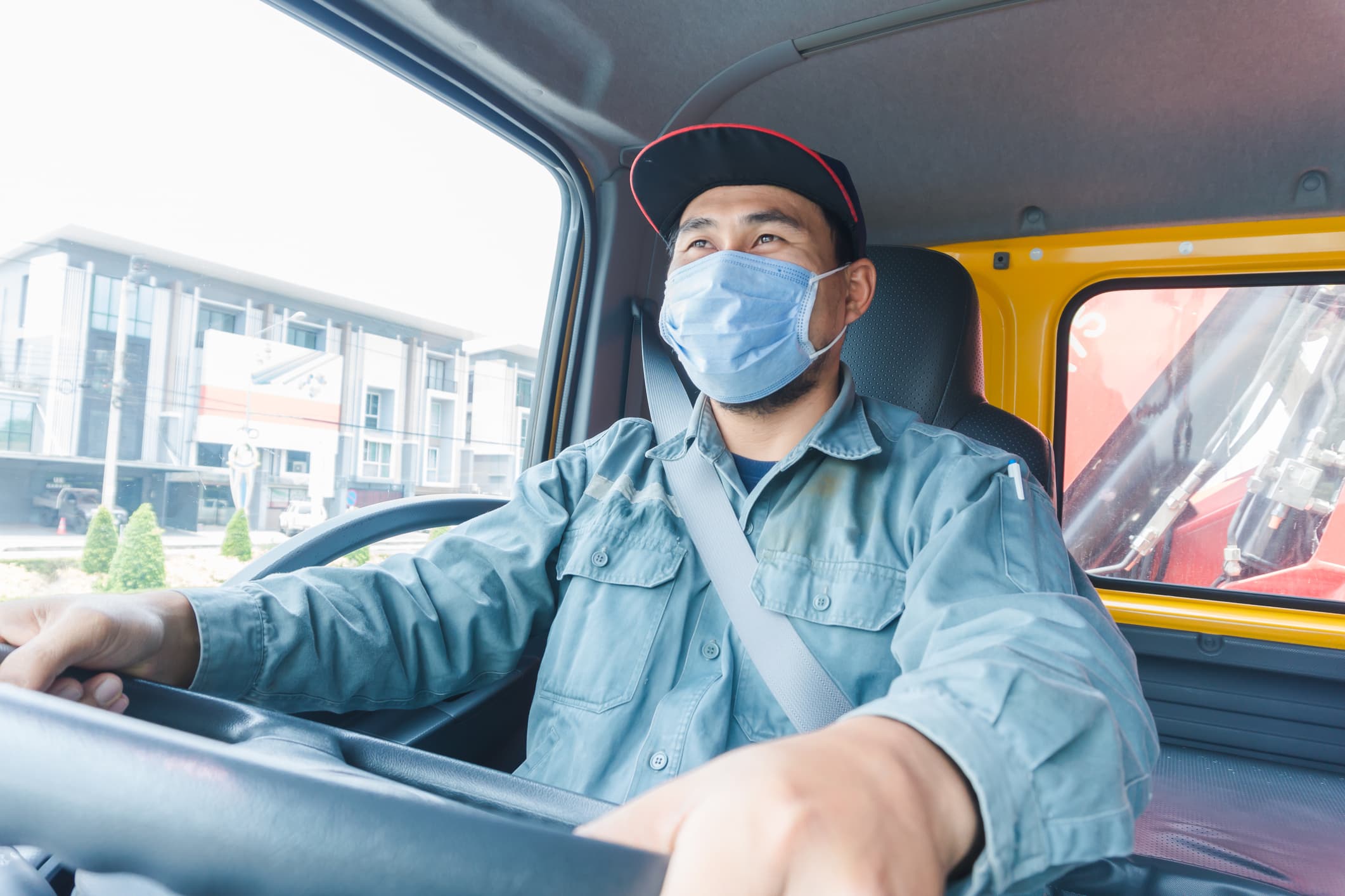 Truck driver wearing a mask