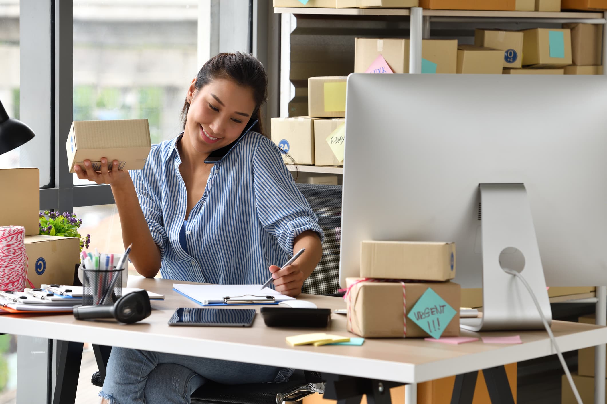Businesswoman sitting in front of a computer
