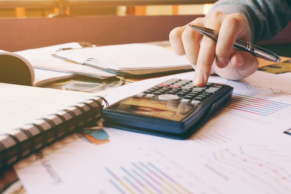 person using a calculator